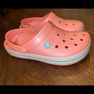 Coral and turquoise crocs
